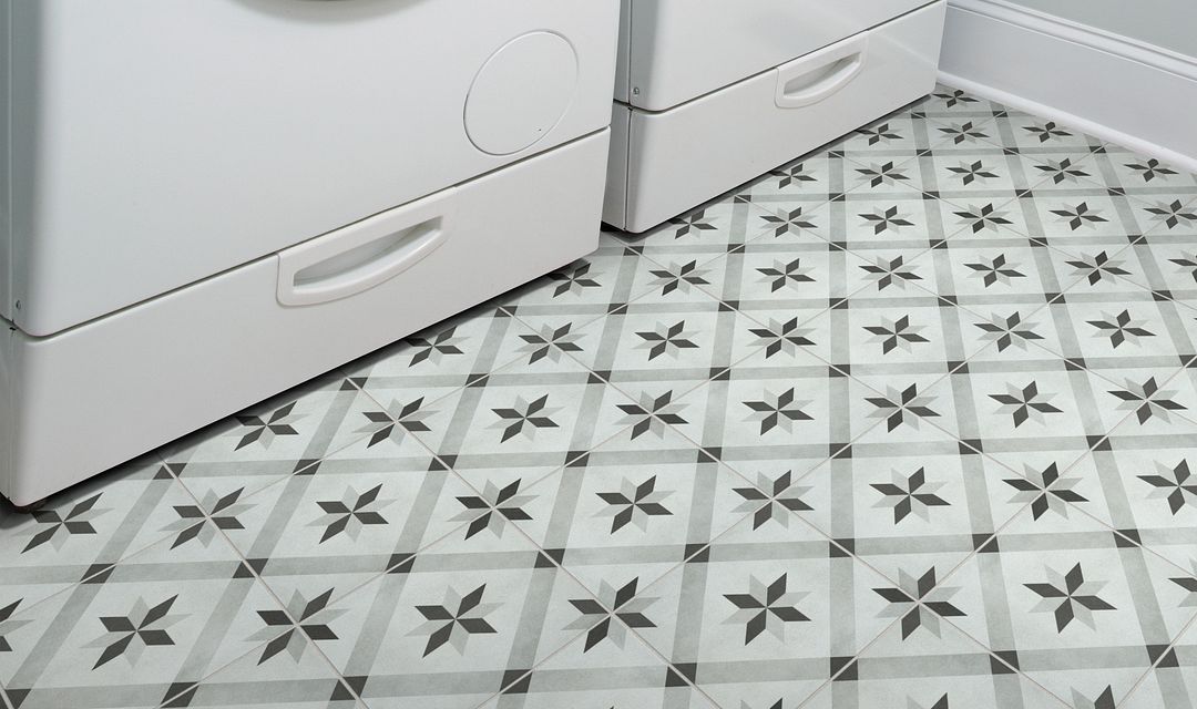 laundry laundry room with patterned tile floor in grays and whites